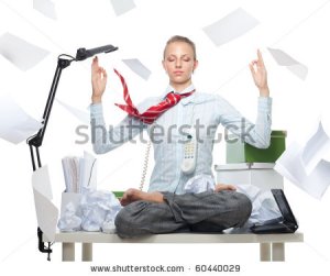 stock-photo-calm-business-woman-despite-huge-disorder-on-table-and-flying-papers-60440029